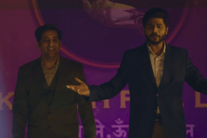 Still from The Networker showing Vikram Kochhar and Durgesh Kumar plotting their AI scam business in a comedic crime-drama setting