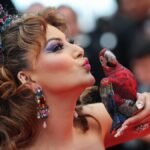 Urvashi Rautela Cannes 2025 – Urvashi Rautela poses with a Rs 4 lakh crystal parrot clutch at the Cannes 2025 red carpet. | Photo Credit: REUTERS